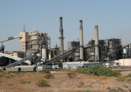 A large industrial area with many pipes and stacks.